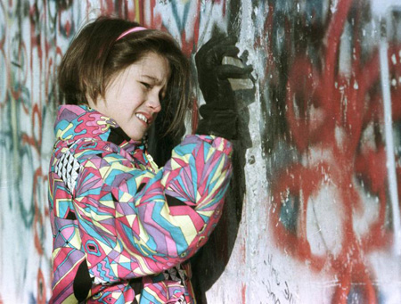 East German Girl Breaking Through the Berlin Wall November 1989