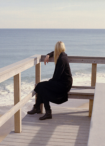 Girl in Dark Black Clothes at the Beach Heroin Chic