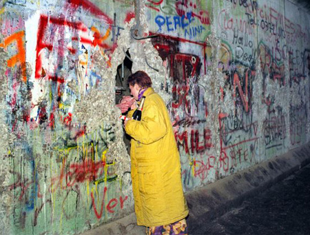 Lighting Cigarette Through the Berlin Wall