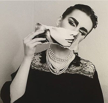 Model with Ripped Magazine Page