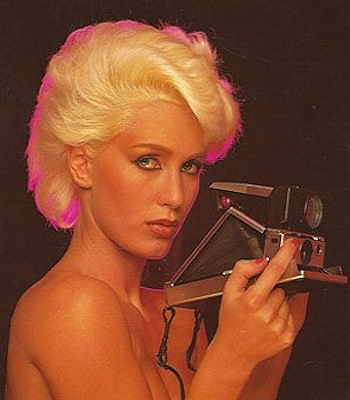 Paula Yates with Polaroid Land Camera