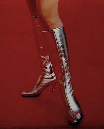 Silver Space Age Boots on Red Background